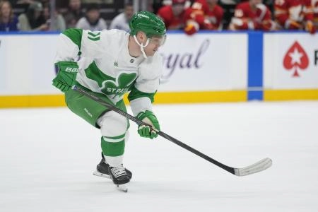 Mar 17, 2025; Toronto, Ontario, CAN; Toronto Maple Leafs forward Max Domi (11) skates against the Calgary Flames during the second period at Scotiabank Arena. Mandatory Credit: John E. Sokolowski-Imagn Images