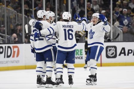Apr 30, 2024; Boston, Massachusetts, USA; The Toronto Maple Leafs celebrate a goal by defenseman Jake McCabe (22) during the first period in game five of the first round of the 2024 Stanley Cup Playoffs against the Boston Bruins at TD Garden. Mandatory Credit: Bob DeChiara-Imagn Images