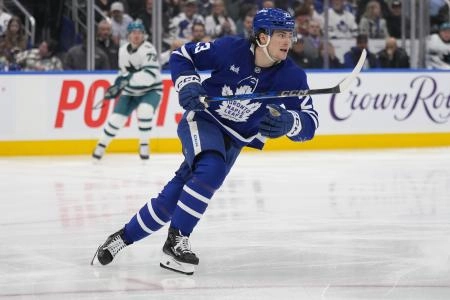 Mar 3, 2025; Toronto, Ontario, CAN; Toronto Maple Leafs forward Matthew Knies (23) skates against the San Jose Sharks during the first period at Scotiabank Arena. Mandatory Credit: John E. Sokolowski-Imagn Images