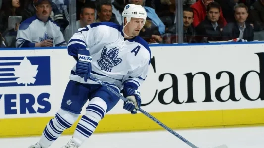 Gary Roberts (#7) focuses on the puck during a game as a member of the Maple Leafs. Roberts spent four seasons with Toronto. Photo Credit - NHLI / NHL.com