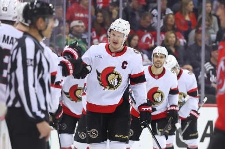 Mar 22, 2025; Newark, New Jersey, USA; Ottawa Senators left wing Brady Tkachuk (7) celebrates his goal against the New Jersey Devils during the second period at Prudential Center. Mandatory Credit: Ed Mulholland-Imagn Images