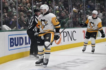 Apr 5, 2025; Dallas, Texas, USA; Pittsburgh Penguins right wing Bryan Rust (17) celebrates after he scores game tying goal against the Dallas Stars during the third period at the American Airlines Center. Mandatory Credit: Jerome Miron-Imagn Images