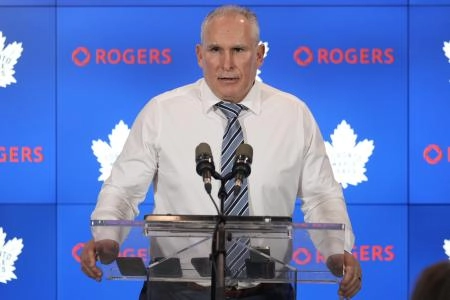 Mar 19, 2025; Toronto, Ontario, CAN; Toronto Maple Leafs head coach Craig Berube listens to a question from the media during the post game press conference after a win over the Colorado Avalanche at Scotiabank Arena. Mandatory Credit: John E. Sokolowski-Imagn Images
