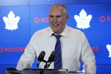 Apr 2, 2025; Toronto, Ontario, CAN; Toronto Maple Leafs head coach Craig Berube smiles during a post game press conference after a win over the Florida Panthers at Scotiabank Arena. Mandatory Credit: John E. Sokolowski-Imagn Images