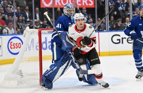 Apr 22, 2025; Toronto, Ontario, CAN; Ottawa Senators forward Ridly Greig (71) skates past Toronto Maple Leafs goalie Anthony Stolarz (41) in the second period in game two of the first round of the 2025 Stanley Cup Playoffs at Scotiabank Arena. Mandatory Credit: Dan Hamilton-Imagn Images