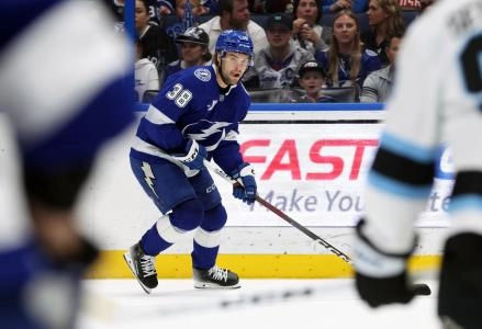 Mar 27, 2025; Tampa, Florida, USA;Tampa Bay Lightning left wing Brandon Hagel (38) skates with the puck against the Utah Hockey Club during the first period at Amalie Arena. Mandatory Credit: Kim Klement Neitzel-Imagn Images