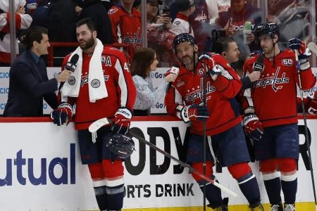 Apr 30, 2025; Washington, District of Columbia, USA; Washington Capitals right wing Tom Wilson (43), Capitals left wing Alex Ovechkin (8), and Capitals left wing Pierre-Luc Dubois (80) give on ice interviews after their game against the Montreal Canadiens in game five of the first round of the 2025 Stanley Cup Playoffs at Capital One Arena. Mandatory Credit: Geoff Burke-Imagn Images