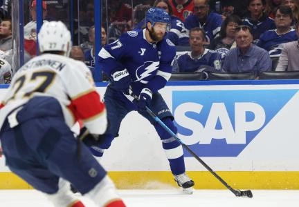 Apr 30, 2025; Tampa, Florida, USA; Tampa Bay Lightning defenseman Victor Hedman (77) passes the puck against the Florida Panthers during the first period of game five of the first round of the 2025 Stanley Cup Playoffs at Amalie Arena. Mandatory Credit: Kim Klement Neitzel-Imagn Images