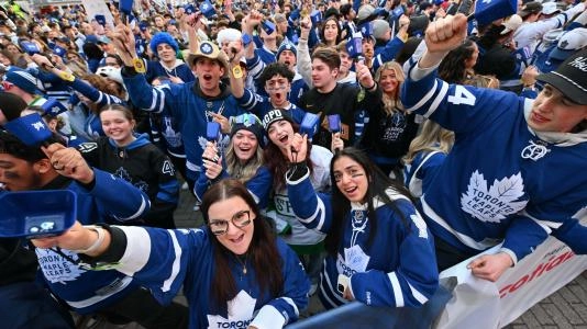 Apr 22, 2025; Toronto, Ontario, CAN; Toronto Maple Leafs fans gather in Maple Leaf Square before the opening faceoff against the Ottawa Senators in game two of the first round of the 2025 Stanley Cup Playoffs at Scotiabank Arena. Mandatory Credit: Dan Hamilton-Imagn Images