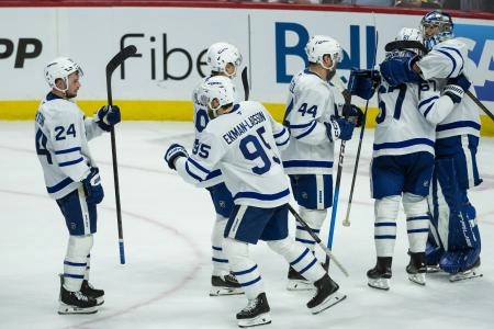 May 1, 2025; Ottawa, Ontario, CAN;The Toronto Maple Leafs celebrate their win against Ottawa Senators in game six of the first round of the 2025 Stanley Cup Playoffs at Canadian Tire Centre. Mandatory Credit: Marc DesRosiers-Imagn Images