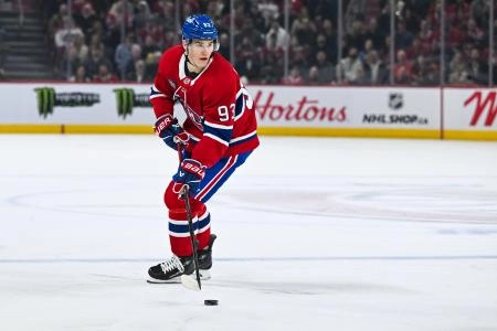 Apr 16, 2025; Montreal, Quebec, CAN; Montreal Canadiens right wing Ivan Demidov (93) considers his options with the puck against the Carolina Hurricanes in the first period at Bell Centre. Mandatory Credit: David Kirouac-Imagn Images Apr 16, 2025; Montreal, Quebec, CAN; Montreal Canadiens right wing Ivan Demidov (93) considers his options with the puck against the Carolina Hurricanes in the first period at Bell Centre. Mandatory Credit: David Kirouac-Imagn Images