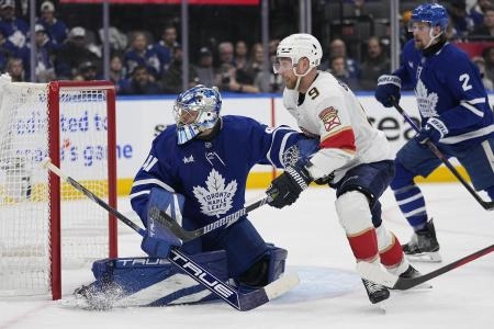 May 5, 2025; Toronto, Ontario, CAN; Toronto Maple Leafs goaltender Anthony Stolarz (41) and Florida Panthers forward Sam Bennett (9) battle for position in front of the goal during the second period of the second round of the 2025 Stanley Cup Playoffs at Scotiabank Arena. Mandatory Credit: John E. Sokolowski-Imagn Images