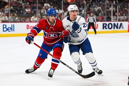 Sep 30, 2023; Montreal, Quebec, CAN; Montreal Canadiens center Alex Newhook (15) battles for position with Toronto Maple Leafs left wing Matthew Knies (23) during the first period at Bell Centre. Mandatory Credit: David Kirouac-Imagn Images Sep 30, 2023; Montreal, Quebec, CAN; Montreal Canadiens center Alex Newhook (15) battles for position with Toronto Maple Leafs left wing Matthew Knies (23) during the first period at Bell Centre. Mandatory Credit: David Kirouac-Imagn Images