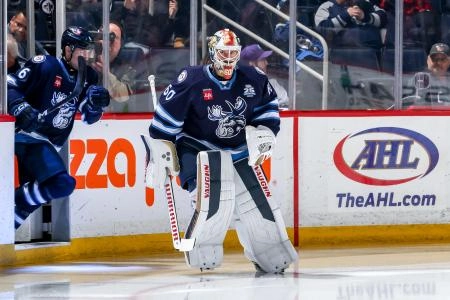 Former Winnipeg Jets goaltender Chris Driedger warming up for the Manitoba Moose in the AHL.