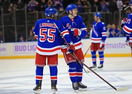 Kaapo Kakko and Ryan Lindgren