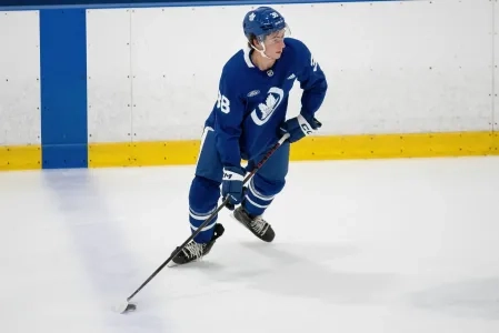 Maple Leafs defensive prospect Ben Danford (38) skates with the puck during Toronto's development camp.