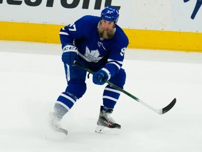 May 20, 2021; Toronto, Ontario, CAN; Toronto Maple Leafs forward Joe Thornton (97) passes the puck against the Montreal Canadiens during the first period of game one of the first round of the 2021 Stanley Cup Playoffs at Scotiabank Arena. Mandatory Credit: John E. Sokolowski-Imagn Images