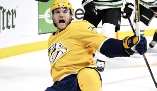 Predators forward Rocco Grimaldi celebrates a goal