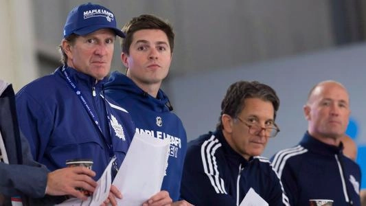 Maple Leafs GM Kyle Dubas and coach Mike Babcock with Brendan Shanahan