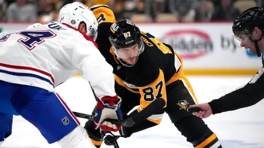 Pittsburgh's Sidney Crosby takes a faceoff