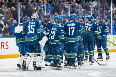 Vancouver Canucks celebrating a win following Fridays preseason finale on Friday against the Edmonton Oilers.