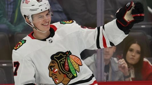 Blackhawks Lukas Reichel celebrates a goal