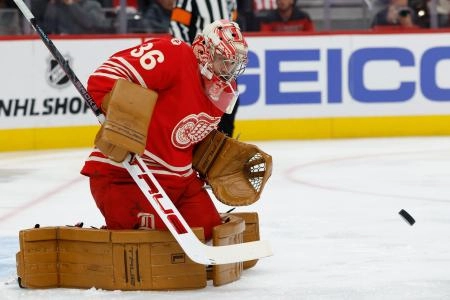 Oct 9, 2025; Detroit, Michigan, USA; Detroit Red Wings goaltender John Gibson (36) makes the save in the first period against the Montréal Canadiens at Little Caesars Arena. Mandatory Credit: Rick Osentoski-Imagn Images