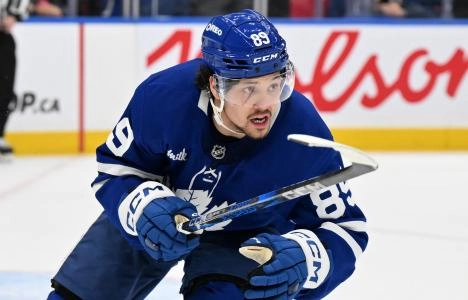 Jan 16, 2025; Toronto, Ontario, CAN; Toronto Maple Leafs forward Nick Robertson (89) pursues the play against the New Jersey Devils in the third period at Scotiabank Arena. Mandatory Credit: Dan Hamilton-Imagn Images
