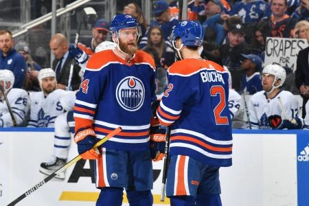 Mattias Ekholm and Evan Bouchard of the Edmonton Oilers.