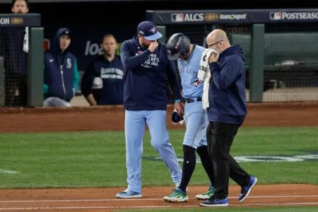 Oct 17, 2025; Seattle, Washington, USA; Toronto Blue Jays manager John Schneider (14) checks on designated hitter George Springer (4) after being hit by a pitch in the seventh inning during game five of the ALCS round for the 2025 MLB playoffs at T-Mobile Park.
