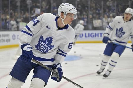 Mar 29, 2025; Los Angeles, California, USA; Toronto Maple Leafs center David Kampf (64) warms up prior to the game against the Los Angeles Kings at Crypto.com Arena. Mandatory Credit: Jayne Kamin-Oncea-Imagn Images