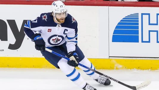 Winnipeg Jets' Adam Lowry skates during a hockey game