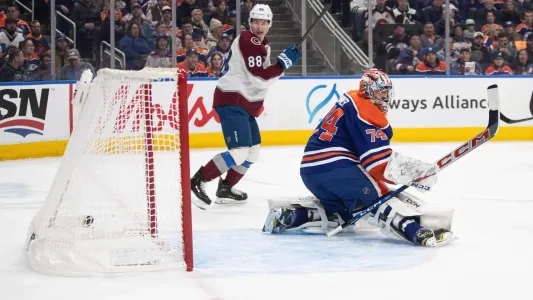 Oilers goalie Stuart Skinner allows a goal