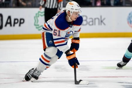 Jan 4, 2025; Seattle, Washington, USA; Edmonton Oilers defenseman Troy Stecher (51) skates with the puck against the Seattle Kraken at Climate Pledge Arena