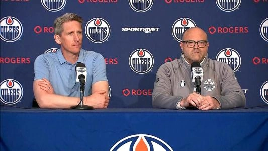 Edmonton Oilers head coach Kris Knoblauch (left) and GM Stan Bowman (right)