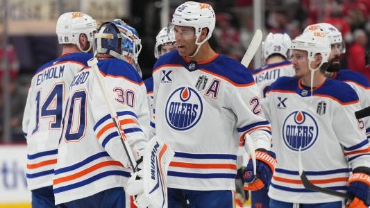 Edmonton Oilers' Darnell Nurse celebrates a win with his teammates