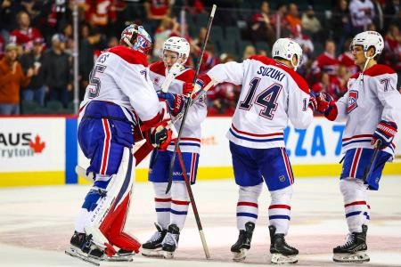 22 octobre 2025; Calgary, Alberta, CAN; Les joueurs des Canadiens de Montréal remportent la victoire contre les Flames de Calgary en prolongation au Scotiabank Saddledome.