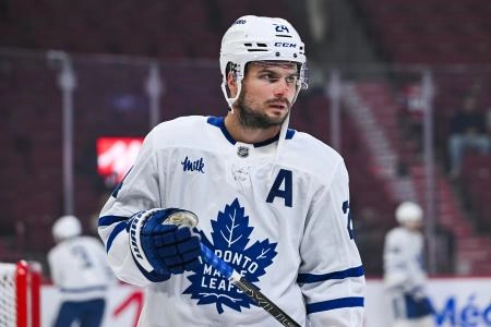 Sep 25, 2025; Montreal, Quebec, CAN; Toronto Maple Leafs forward Scott Laughton (24) looks on during warm-up before the game against the Montreal Canadiens at Bell Centre