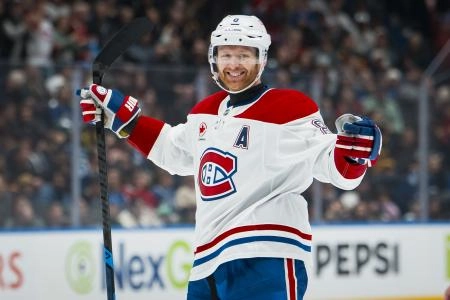 25 octobre 2025 ; Vancouver (Colombie-Britannique, Canada) ; le d&eacute;fenseur des Canadiens de Montr&eacute;al, Mike Matheson (8), c&eacute;l&egrave;bre son but contre les Canucks de Vancouver en troisi&egrave;me p&eacute;riode au Rogers Arena.