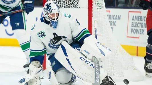 Vancouver Canucks' Louis Domingue makes a save during a game