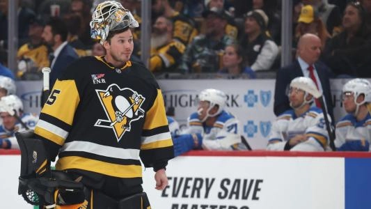 Pittsburgh Penguins' Tristan Jarry skates with his mask off