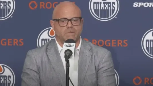 Edmonton Oilers GM Stan Bowman speaks to reporters