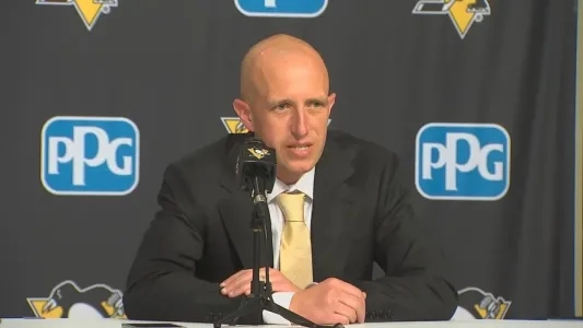 Pittsburgh Penguins head coach Dan Muse talks to reporters