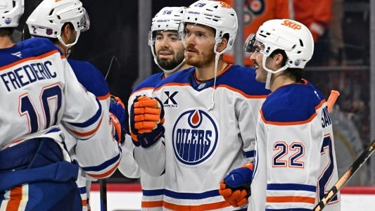 Edmonton Oilers' Jack Roslovic celebrates a goal ith his teammates
