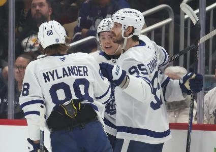 Nov 29, 2025; Pittsburgh, Pennsylvania, USA; Toronto Maple Leafs right wing William Nylander (88) and defenseman Oliver Ekman-Larsson (95) congratulate right wing Easton Cowan (53) on his goal against the Pittsburgh Penguins during the first period at PPG Paints Arena. Mandatory Credit: Charles LeClaire-Imagn Images
