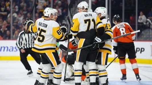 Pittsburgh Penguins players celebrate a goal vs. the Philadelphia Flyers