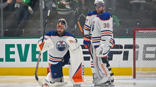 Edmonton Oilers' Stuart Skinner and Calvin Pickard in the net with their masks off