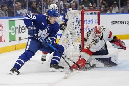 May 18, 2025; Toronto, Ontario, CAN; Florida Panthers goaltender Sergei Bobrovsky (72) knocks the puck and poke checks Toronto Maple Leafs forward Pontus Holmberg (29) during the first period of game seven of the second round of the 2025 Stanley Cup Playoffs at Scotiabank Arena
