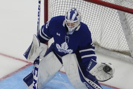 Dec 8, 2025; Toronto, Ontario, CAN; Toronto Maple Leafs goaltender Dennis Hildeby (35) makes a save during warm up before a game against the Tampa Bay Lightning at Scotiabank Arena