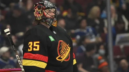 Vancouver Canucks' Thatcher Demko in his net looking on